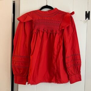 Jcrew cotton blouse. Button detail at the back.